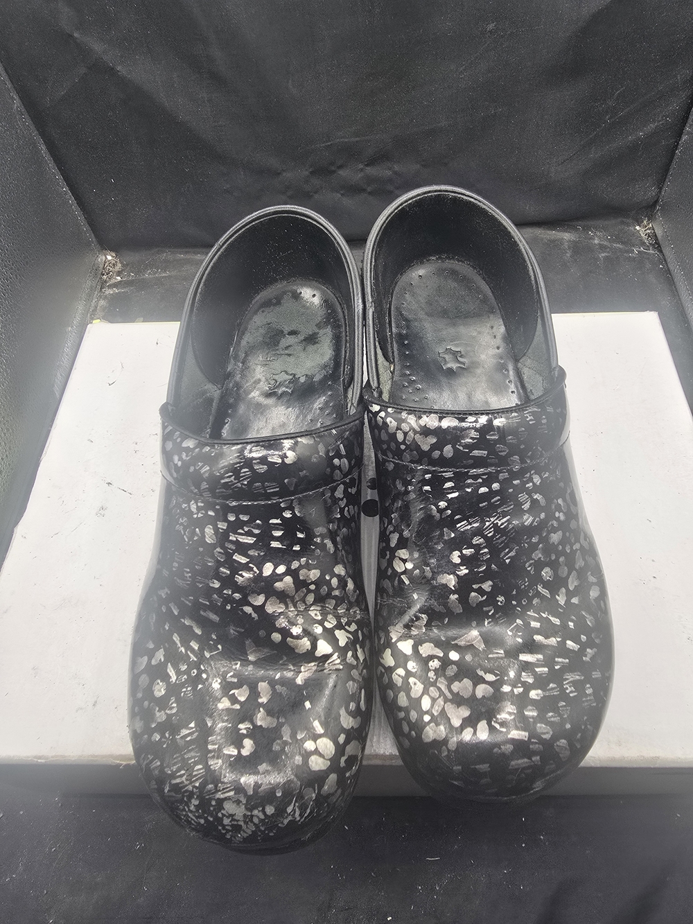 Dansko Black Metallic Spotโ Clogs